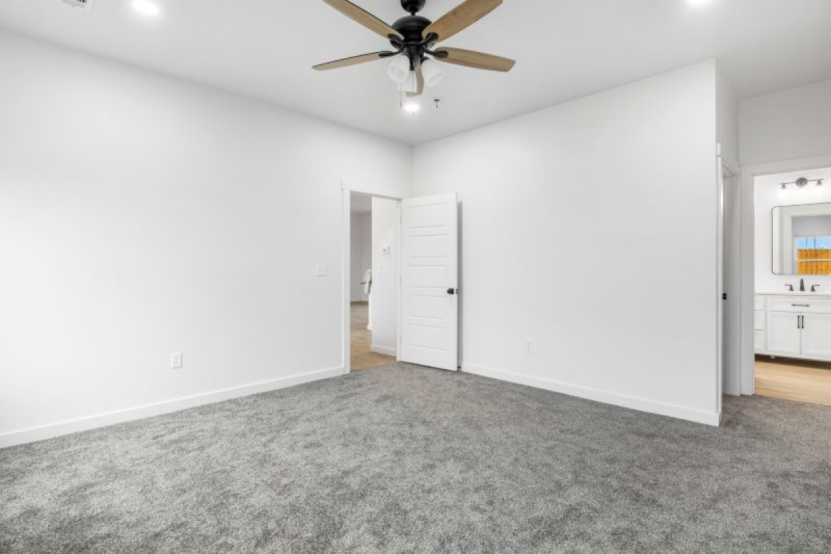 walk in closet and bathroom